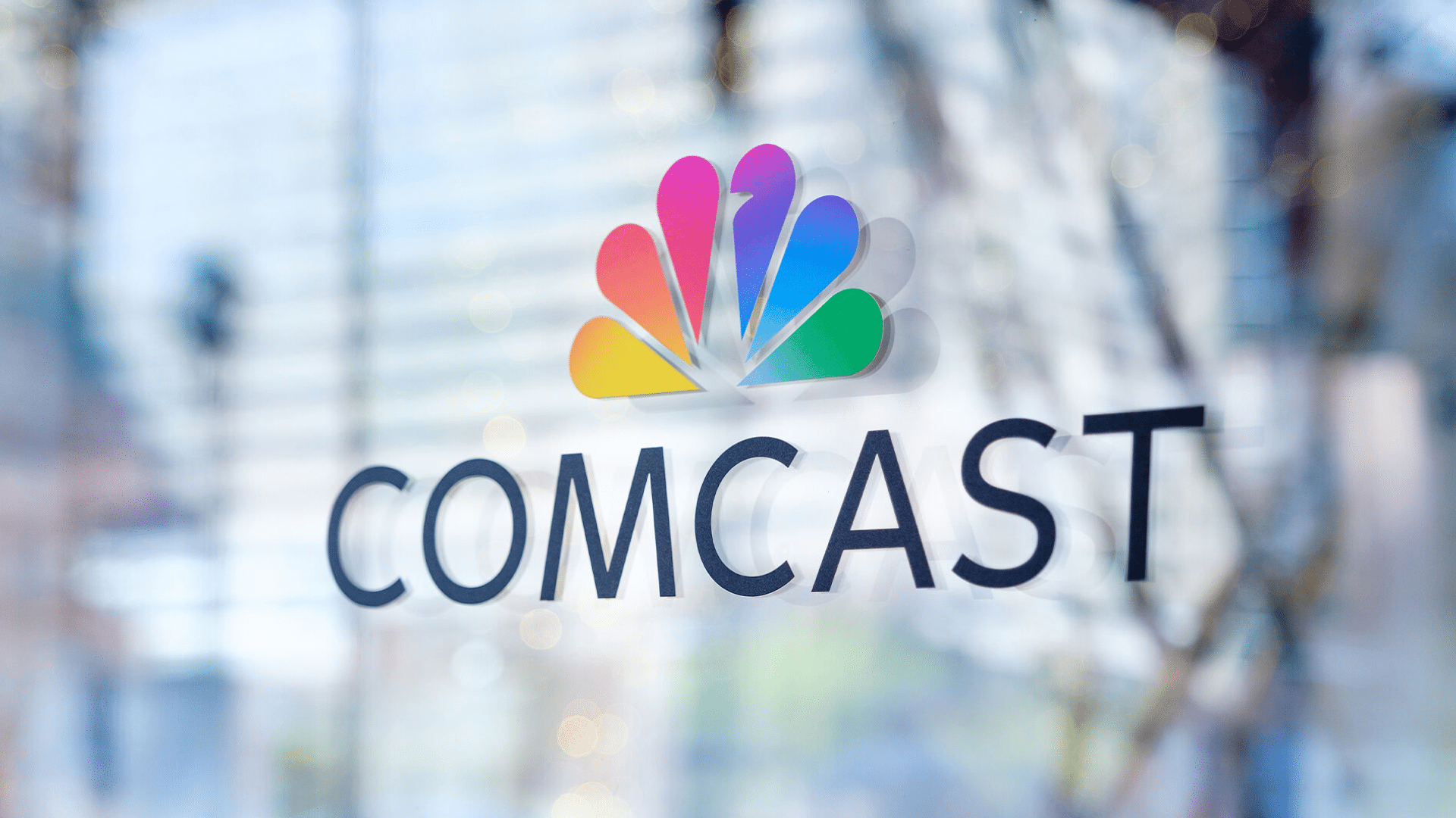 Logo representing comcast as a company that uses aws