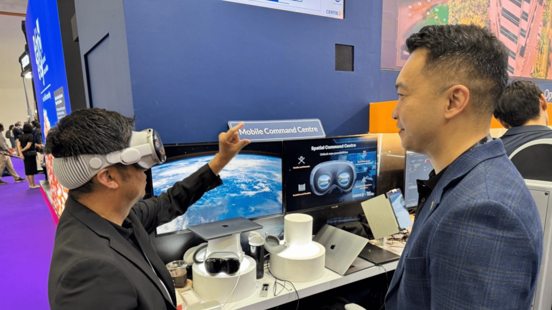 a person interacts with a spatial computing mobile command center using arvr technology