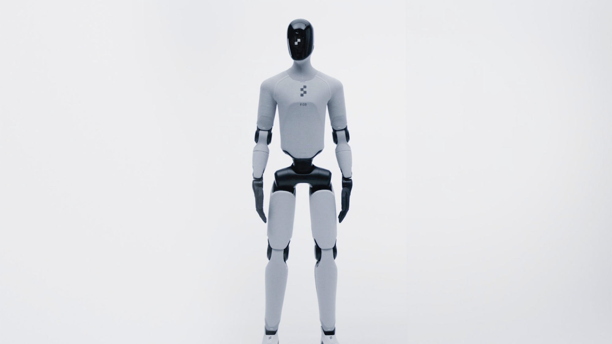 humanoid robot with a sleek design and black and white color scheme