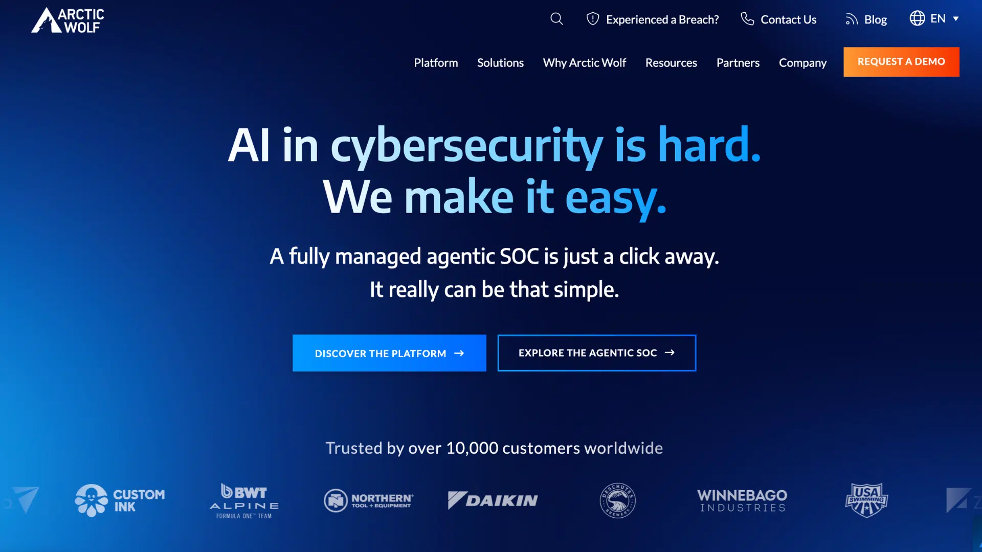 arctic wolf cybersecurity homepage with blue gradient background and ai focused soc platform messaging with demo buttons