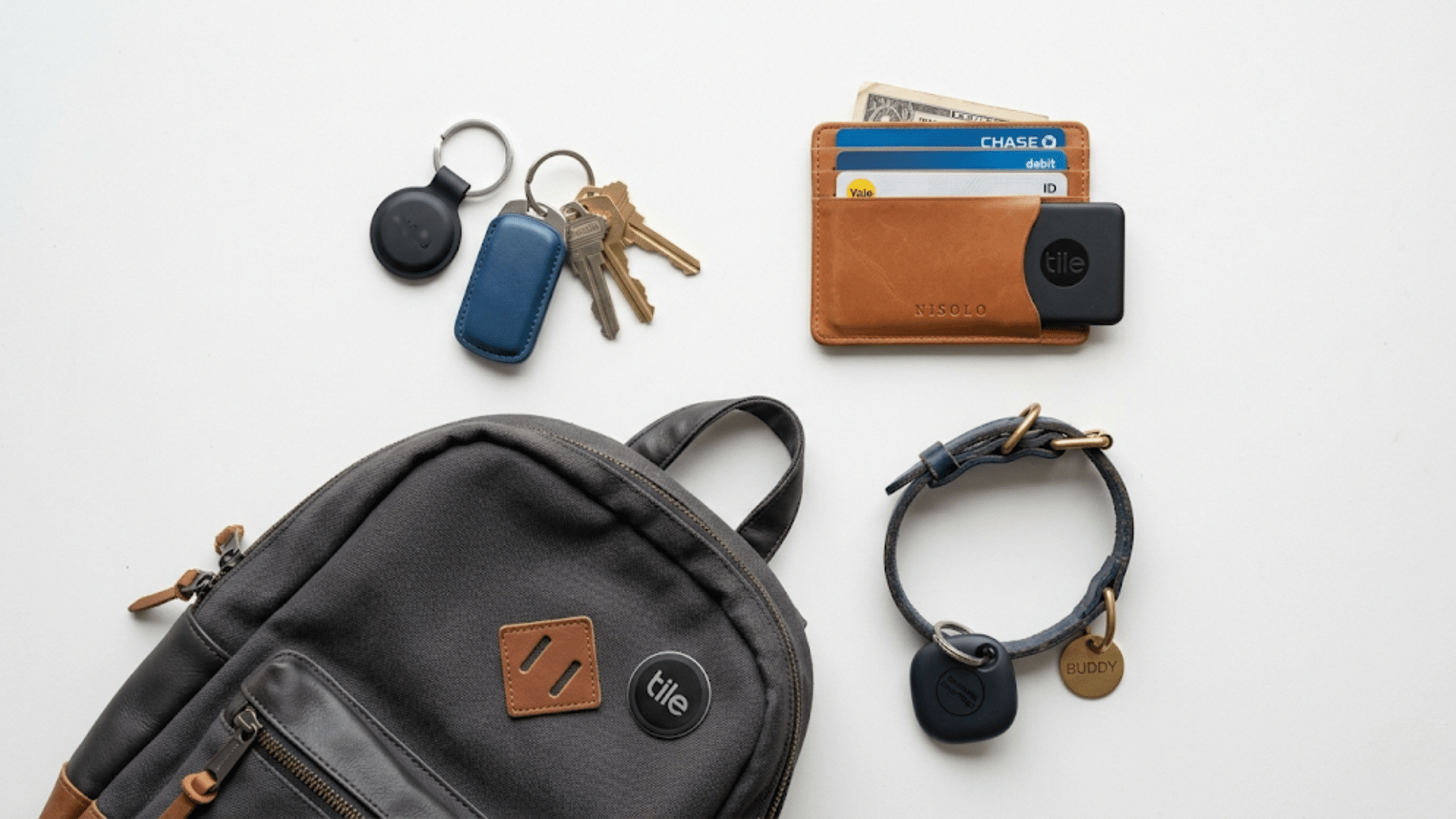 tiny tracking devices attached to keys wallet backpack and pet collar for finding everyday items