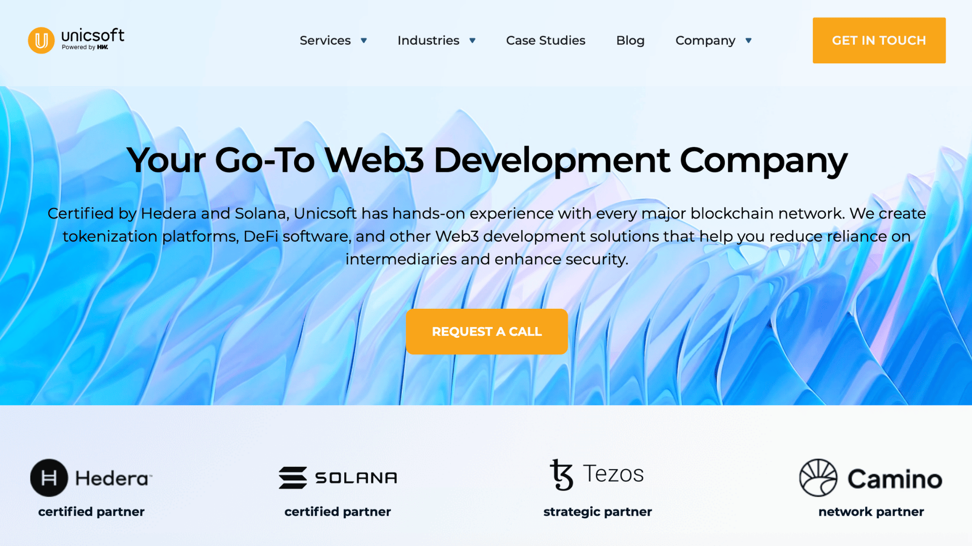 unicsoft web3 development company homepage with blockchain services and certified partner network logos