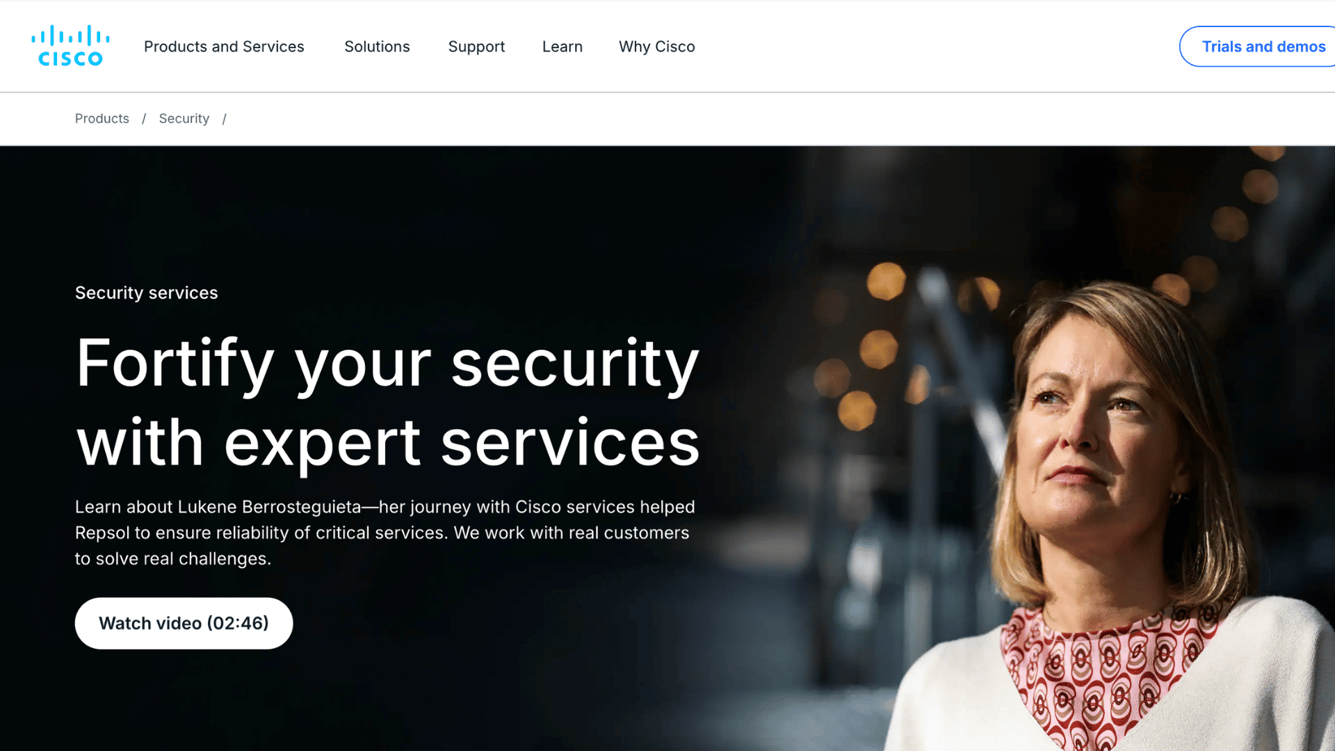 cisco security services webpage featuring a woman in an industrial setting promoting expert cybersecurity and reliability solutions