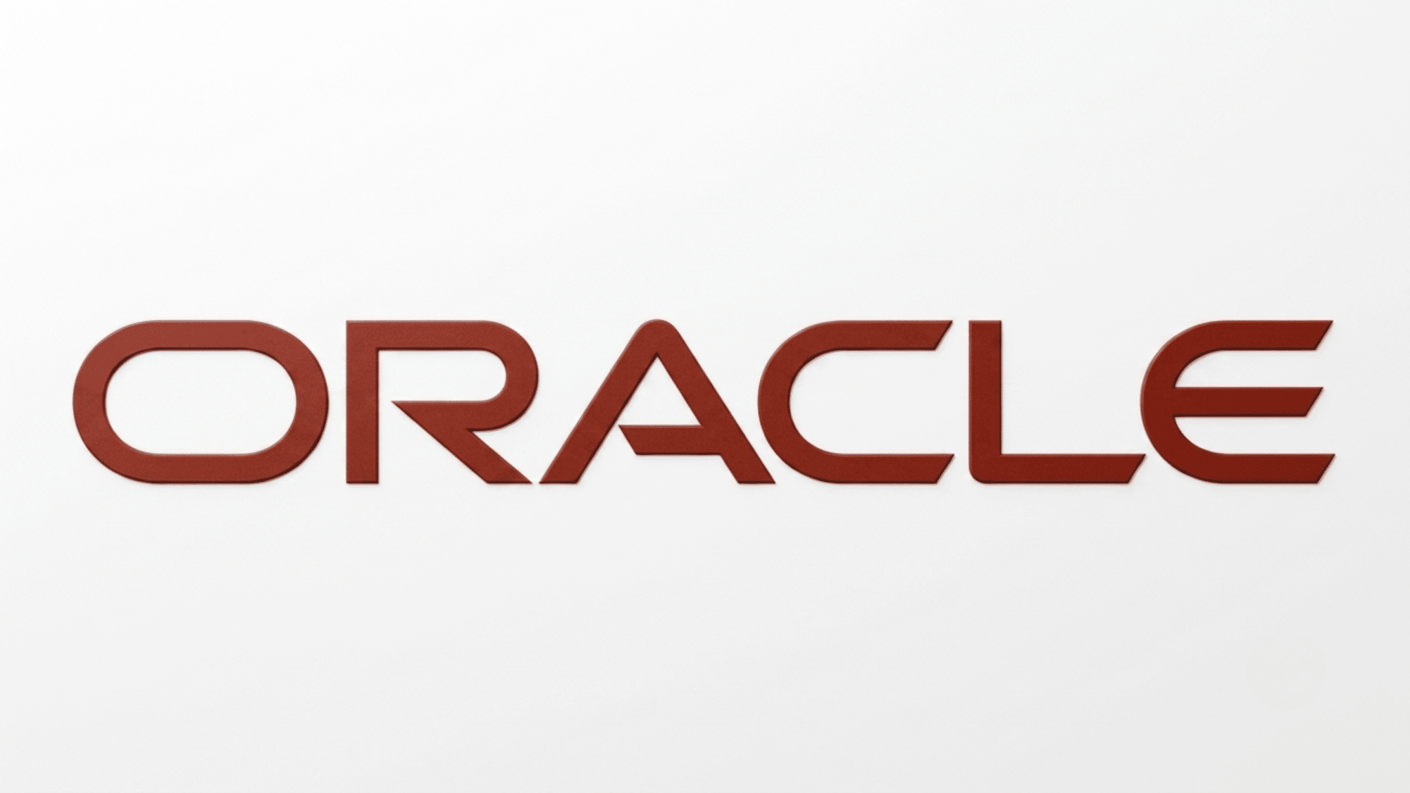 oracle logo displayed in orange uppercase text on a light gray background with a clean minimalist design style (1)
