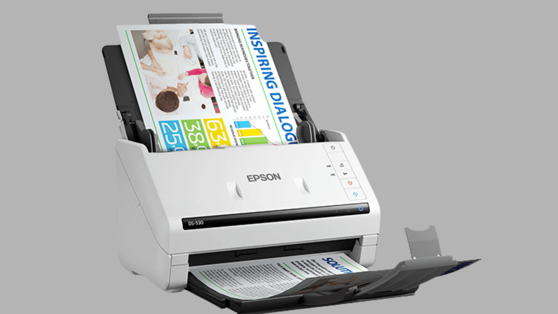 white document scanner feeding printed pages through the input tray with scanned sheets exiting into the output tray