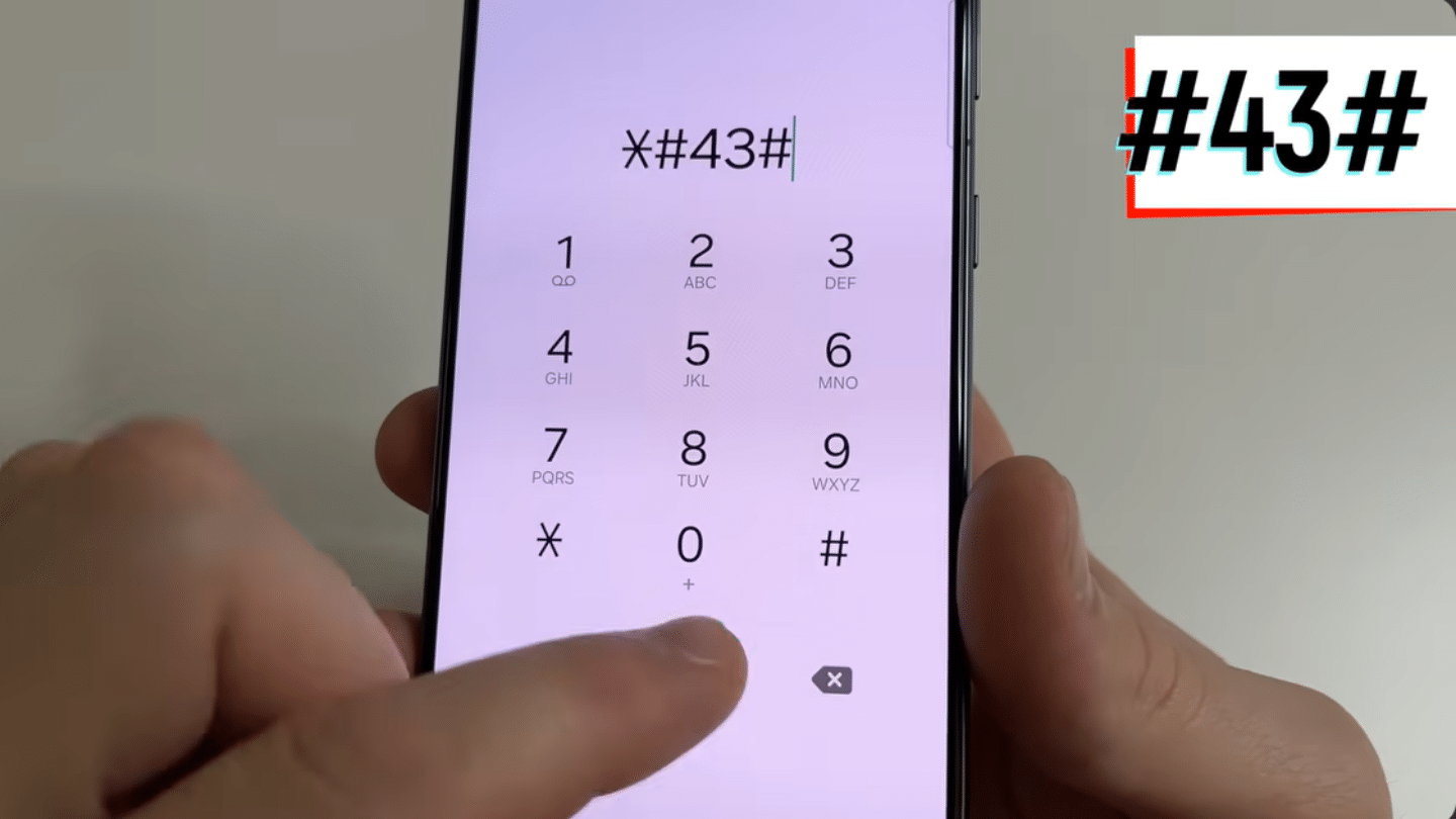 hand dialing code on smartphone keypad screen showing star hash four three hash with finger pressing numbers