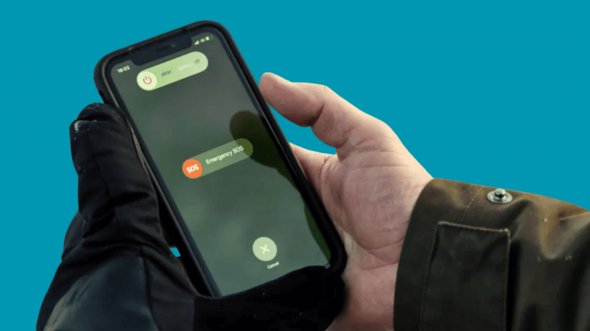 hand holding smartphone displaying emergency sos screen with emergency call option activated outdoors (1)