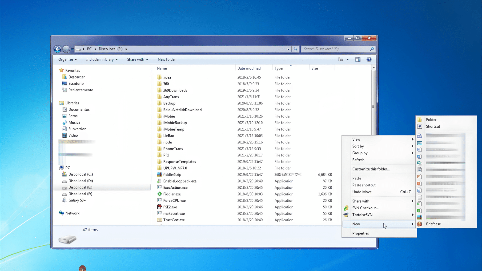windows file explorer open on a local drive with a right click menu showing new folder options while managing files and backups on a computer desktop