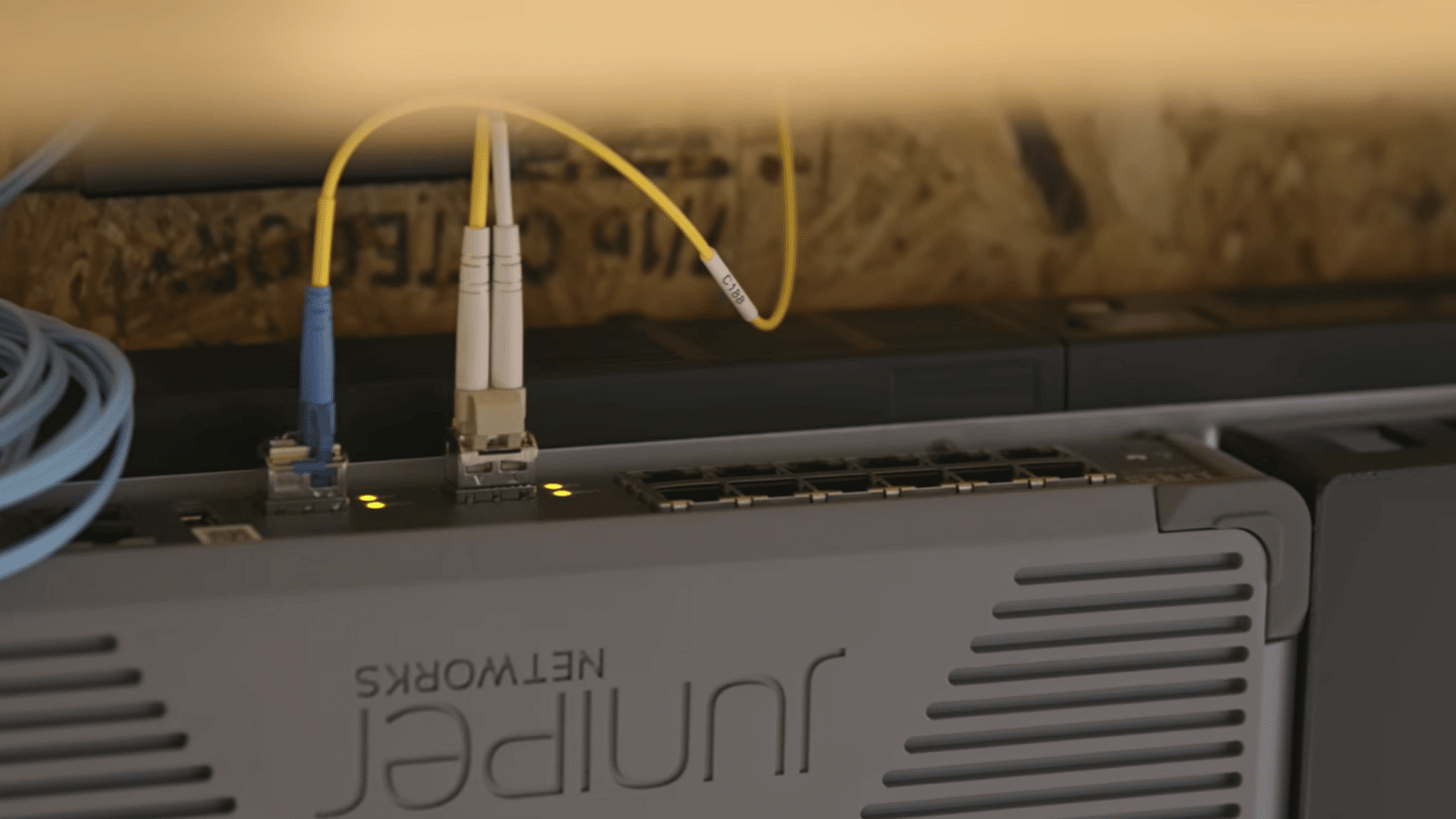 a home router connecting phones laptops televisions and game consoles through wifi and ethernet connections