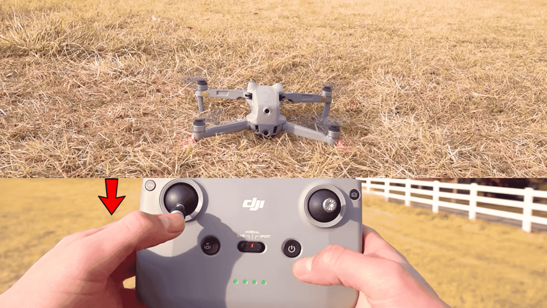 drone landing on dry grass while a pilot lowers the left stick on a dji controller