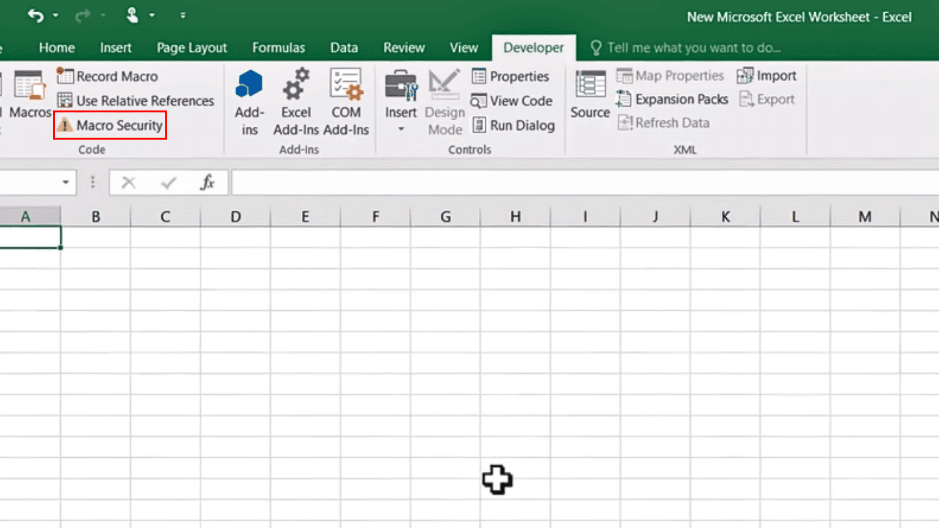excel developer tab showing the macro security button in the code section to enable macros
